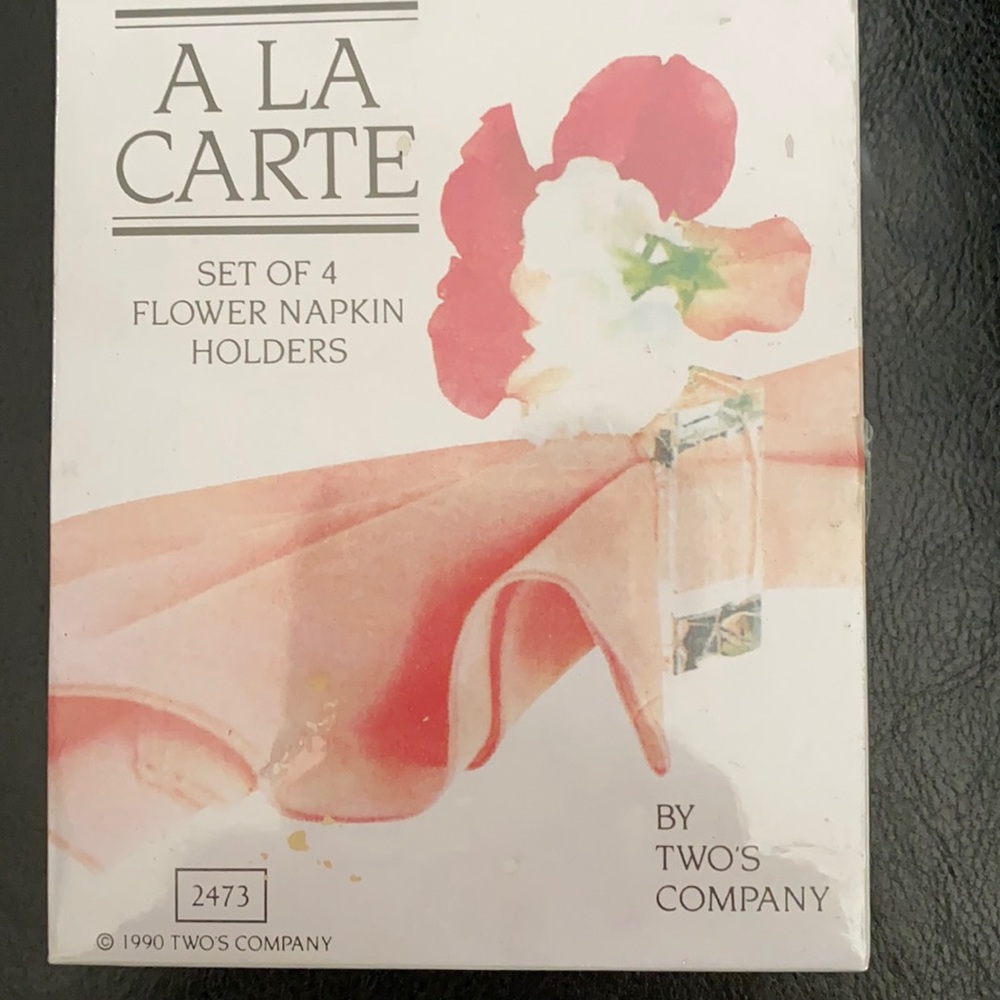 Flower napkin holders.  Lucite. Set of 4